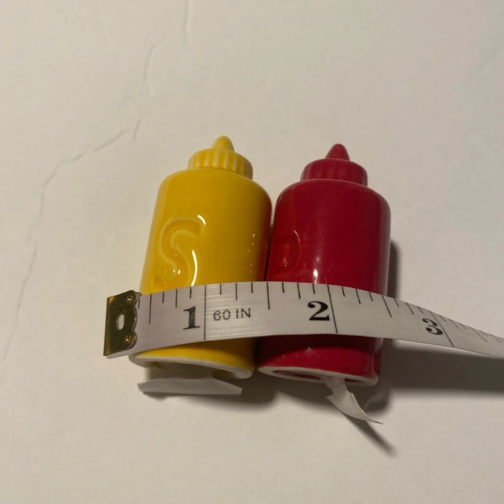 Red and Yellow Condiment Shakers